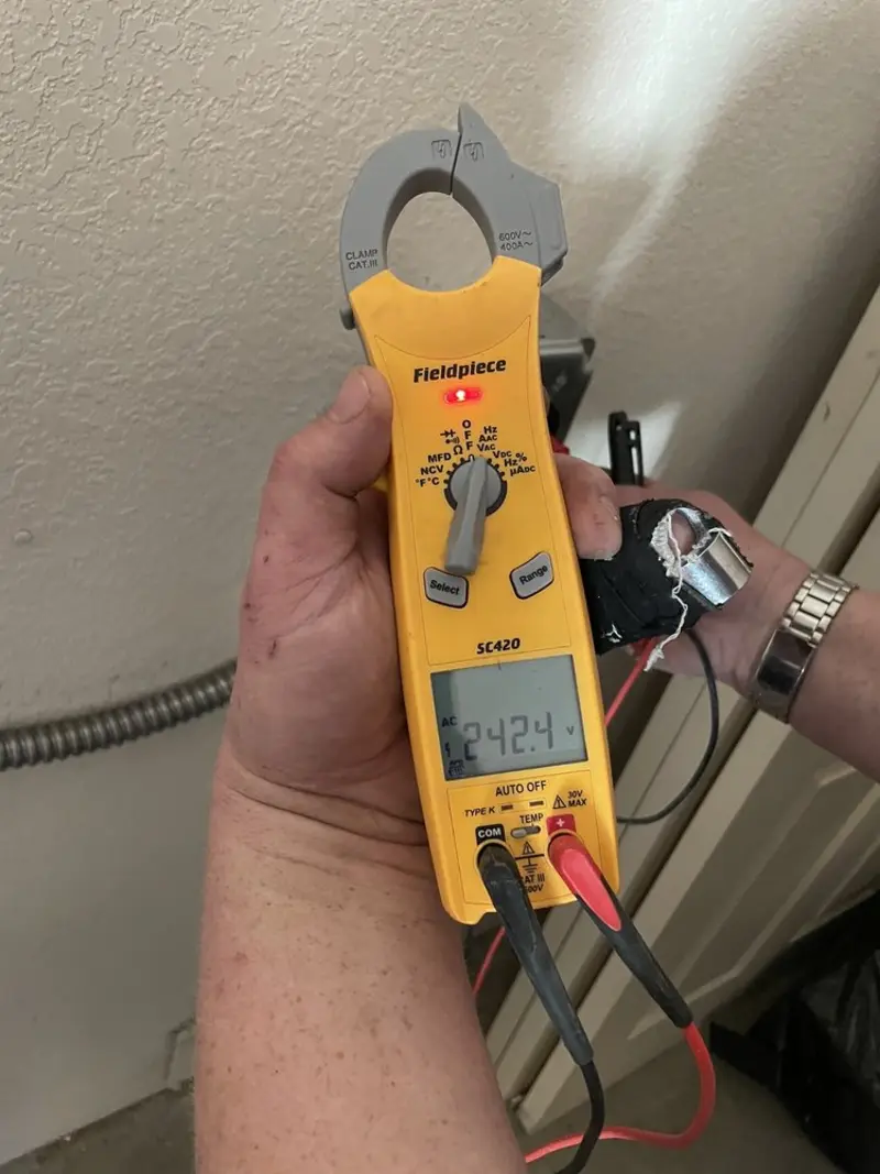 Voltage testing with clamp meter during Generator Installation in Lafayette